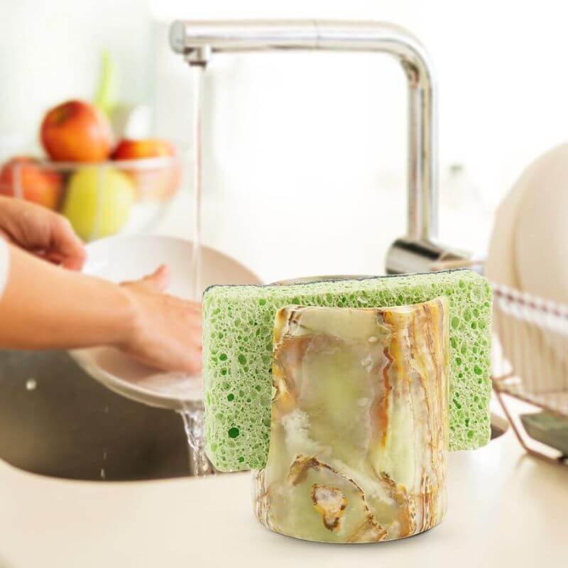 3.5" marble sponge holder with green sponges in a kitchen setting, promoting organization and easy access.