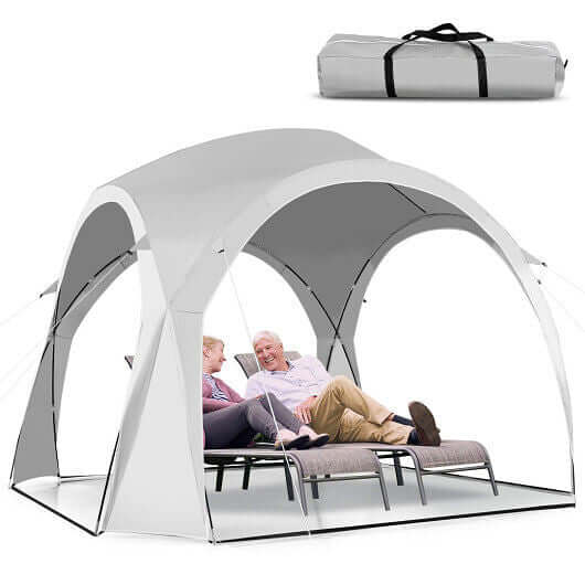 Portable 11x11 feet white patio sun shade canopy tent for outdoor beach use with adults relaxing inside.