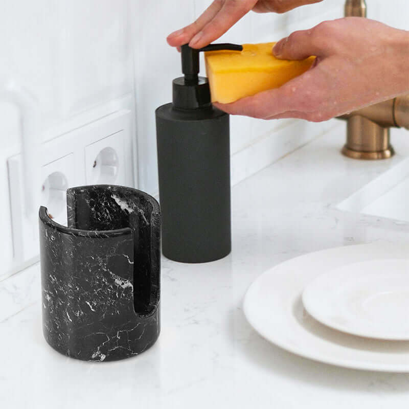 3.5" black marble sponge holder on kitchen counter with sponge and soap dispenser, perfect for organized kitchen sink decor.
