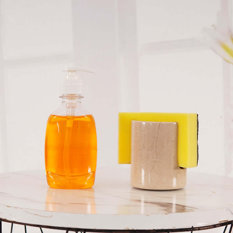 3.5" marble sponge holder next to liquid soap dispenser on a marble table, stylish kitchen counter décor.
