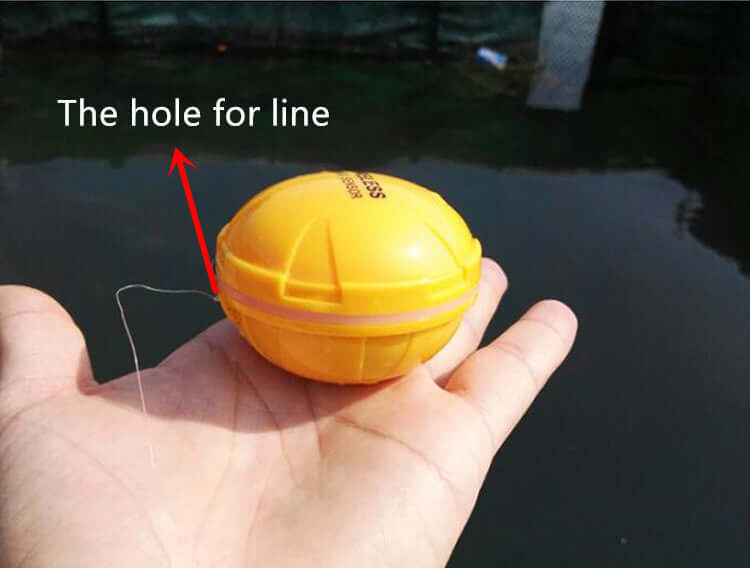 Yellow Wireless Sonar Fish Finder showing line hole feature, ideal for fishing in depths up to 36M.