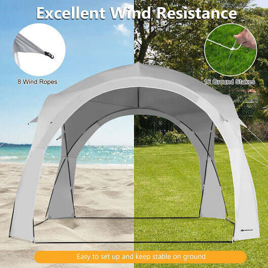 Portable beach sun shade canopy with excellent wind resistance, featuring 8 wind ropes and 16 ground stakes for stability.